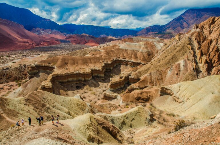 Travelers exploring the stunning landscape of Cafayate Canyon in Salta, Argentina.