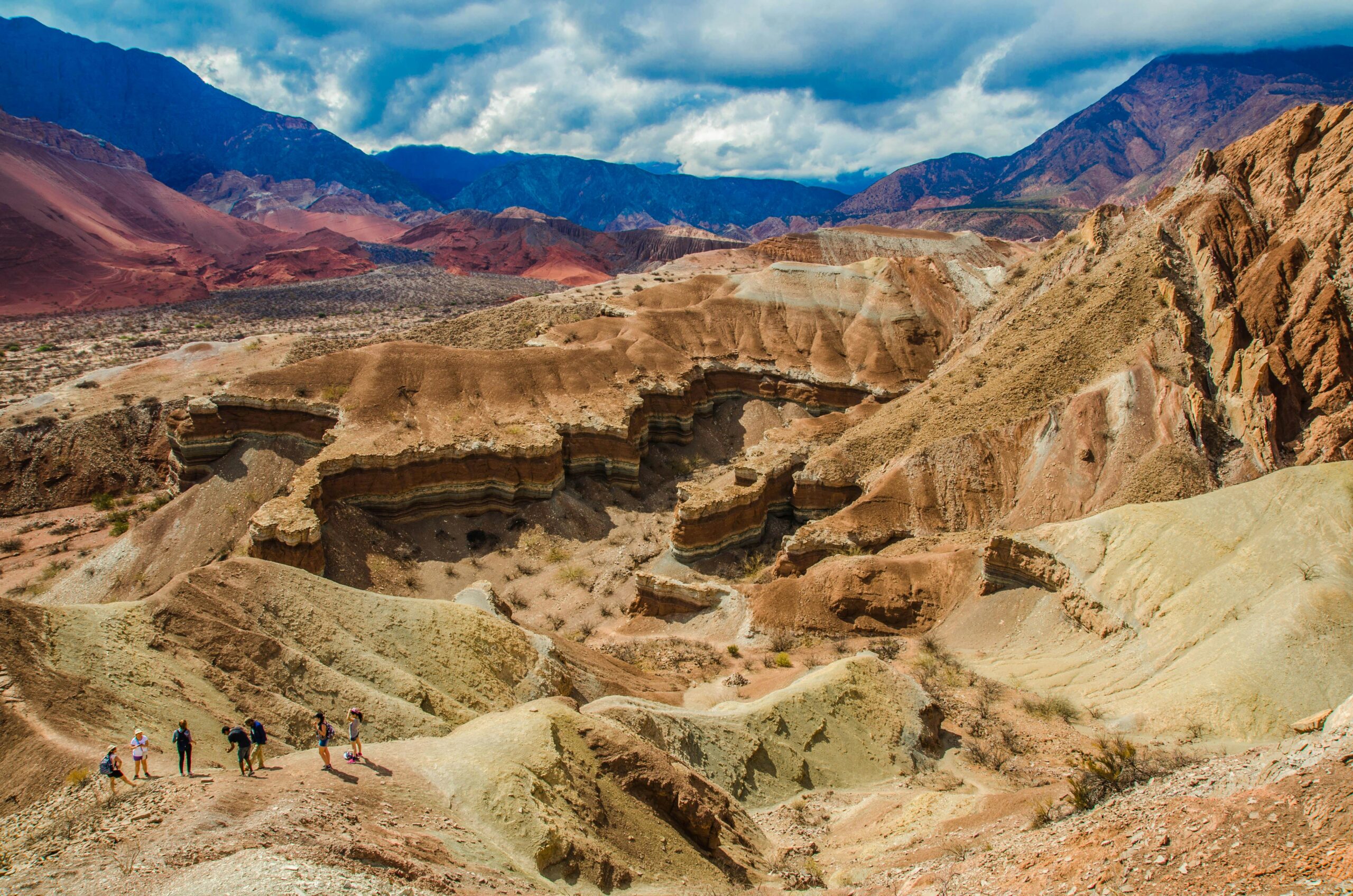 Travelers exploring the stunning landscape of Cafayate Canyon in Salta, Argentina.