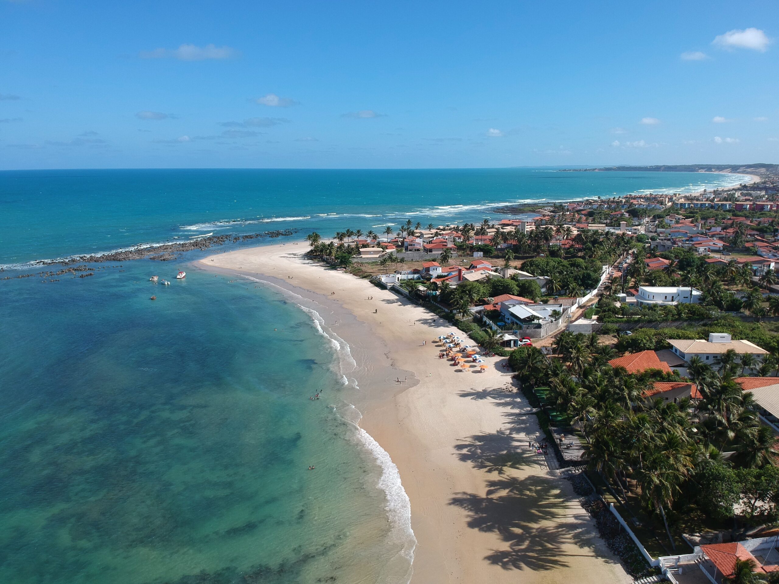 A beautiful aerial view of Ponta Negra beach in Rio Grande do Norte, Brazil, showcasing its stunning coastline.